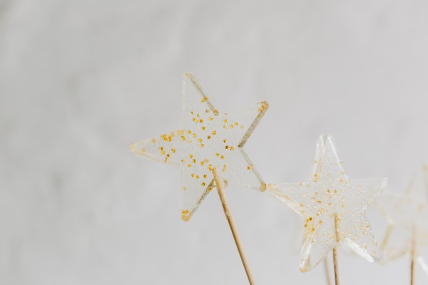 Foto do produto pirulito de caramelo - estrela transparente com dourado